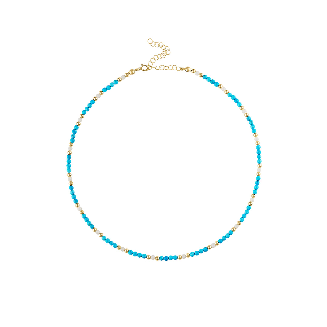 Olivia Le Mykonos Beaded Necklace features a beautiful vibrant turquoise magnesite beaded necklace mixed with white bamboo coral beads and embellished with 3mm gold filled bubble beads as alternating accents all finished with a lobster clasp and extender which allows this necklace to be adjustable from 14 inches to 17 inches 