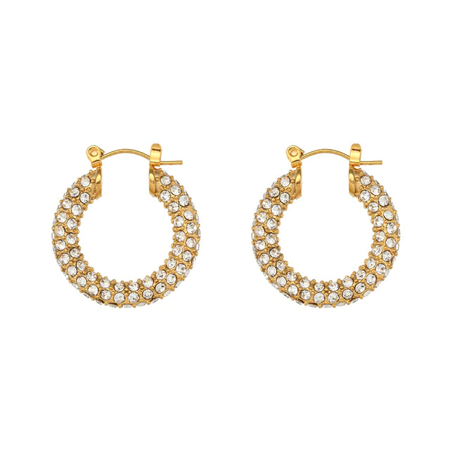 Gold hoop earrings shown with cubic zirconia pave all around hoop earrings shown on white background